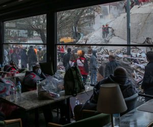 epaselect epa08787364 People sit at a cafe and wait for news from their relatives believed to be trapped under collapsed buildings after a 7.0 magnitude earthquake in the Aegean Sea; at Bayrakli district in Izmir, Turkey, 31 October 2020. According to Turkish media reports, at least twenty four people died while more than eight hundred were injured and dozens of buildings were destroyed in the earthquake.  EPA/ERDEM SAHIN