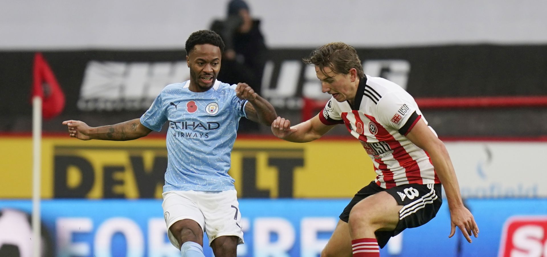 epa08788192 Sander Berge  of Sheffield (R) in action against Raheem Sterling of Manchester City (L) during the English Premier League soccer match between Sheffield United and Manchester City in Sheffield, Britain, 31 October 2020.  EPA/Tim Keeton / POOL EDITORIAL USE ONLY. No use with unauthorized audio, video, data, fixture lists, club/league logos or 'live' services. Online in-match use limited to 120 images, no video emulation. No use in betting, games or single club/league/player publications.