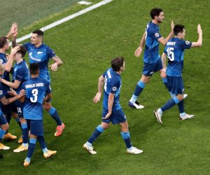epa08798831 Aleksandr Erokhin (far left) of Zenit celebrates with teammates after scoring the opening goal during the UEFA Champions League group F soccer match between FC Zenit St. Petersburg and SS Lazio in St. Petersburg, Russia, 04 November 2020.  EPA/Anatoly Maltsev