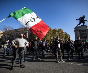 epa08803219 Striking taxi drivers demonstrate in front of the Ministry of Transport to protest against the Ministerial Decree (DPCM) for the Covid-19 Coronavirus emergency, Rome, Italy, 06 November 2020. According to reports, Italian taxi drivers take part in nationwide general strike demanding financial aid from the state as their industry was hit severely due to coronavirus pandemic.  EPA/ANGELO CARCONI