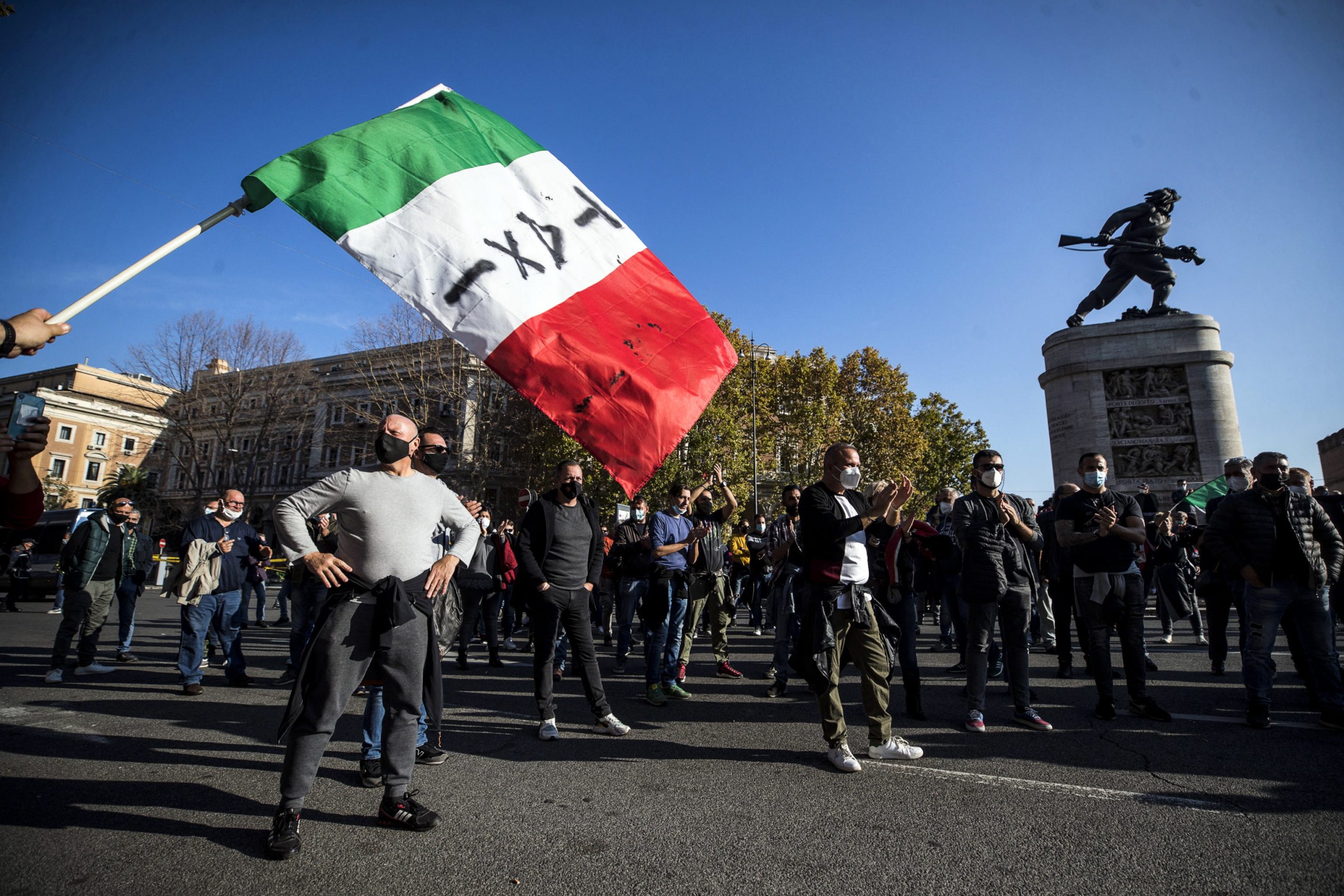 epa08803219 Striking taxi drivers demonstrate in front of the Ministry of Transport to protest against the Ministerial Decree (DPCM) for the Covid-19 Coronavirus emergency, Rome, Italy, 06 November 2020. According to reports, Italian taxi drivers take part in nationwide general strike demanding financial aid from the state as their industry was hit severely due to coronavirus pandemic.  EPA/ANGELO CARCONI