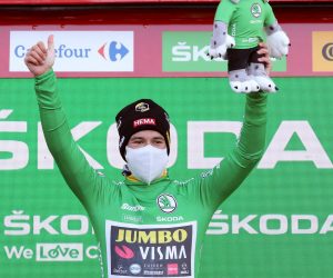 epa08805199 Slovenian rider Primoz Roglic of Team Jumbo-Visma celebrates on the podium wearing the points classification leader's green jersey following the 17th stage of the Vuelta a Espana 2020 cycling race over 178.2km from Sequeros to Alto de la Covatilla, Spain, 07 November 2020.  EPA/Kiko Huesca