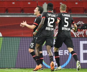 epa08808560 Leverkusen's Julian Baumgartlinger, left, celebrates after scoring his side's 4th goal during the German Bundesliga soccer match between Bayer Leverkusen and Borussia Moenchengladbach at the BayArena in Leverkusen, Germany, Saturday, Nov. 8, 2020.  EPA/Martin Meissner / POOL CONDITIONS - ATTENTION:  The DFL regulations prohibit any use of photographs as image sequences and/or quasi-video.