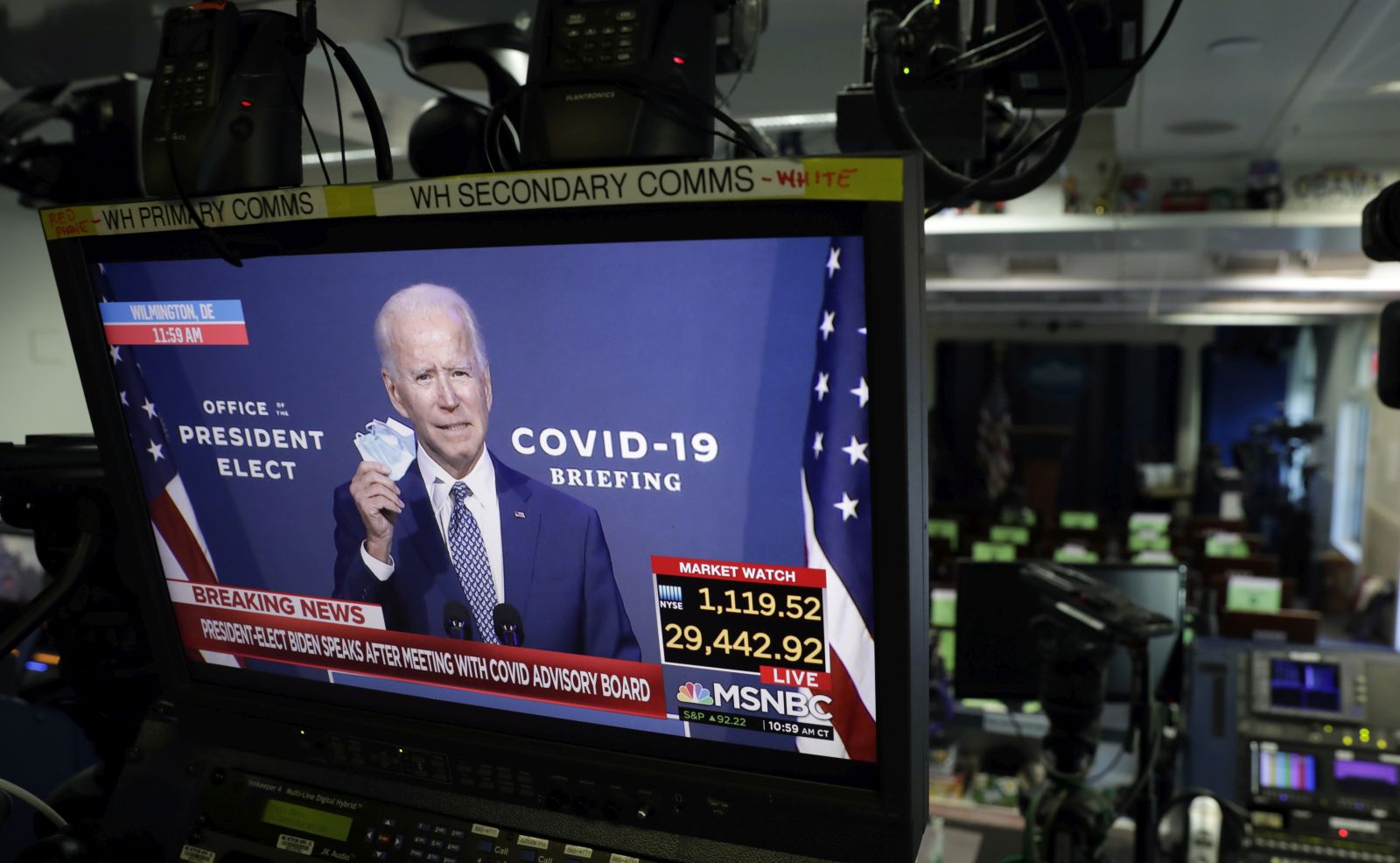epa08810141 US President-elect Joe Biden is seen during his statement on television monitors in the briefing room at the White House in Washington, DC, USA, 09 November 2020.  EPA/Yuri Gripas / POOL