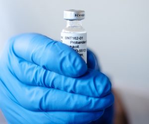 epa08814066 An undated handout made available by the German pharmaceutical company Biontec shows a hand holding an ampoule with BNT162b2, the mRNA-based vaccine candidate against COVID-19, in Mainz, Germany. Pfizer and Biontech SE  announced on 11 November 2020 that they have reached an agreement with the European Commission to supply 200 million doses of their investigational BNT162b2 mRNA-based vaccine candidate against COVID-19 to European Union (EU) Member States, with an option for the European Commission to request an additional 100 million doses.  EPA/BIONTECH SE / HANDOUT  HANDOUT EDITORIAL USE ONLY/NO SALES