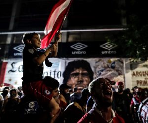 epa08842751 Fans gather to honor Diego Armando Maradona at the Club Argentinos Juniors Stadium, in Buenos Aires, Argentina, 25 November 2020. Diego Maradona has died at the age of 60 after a heart attack on 25 November 2020.  EPA/Juan Ignacio Roncoroni