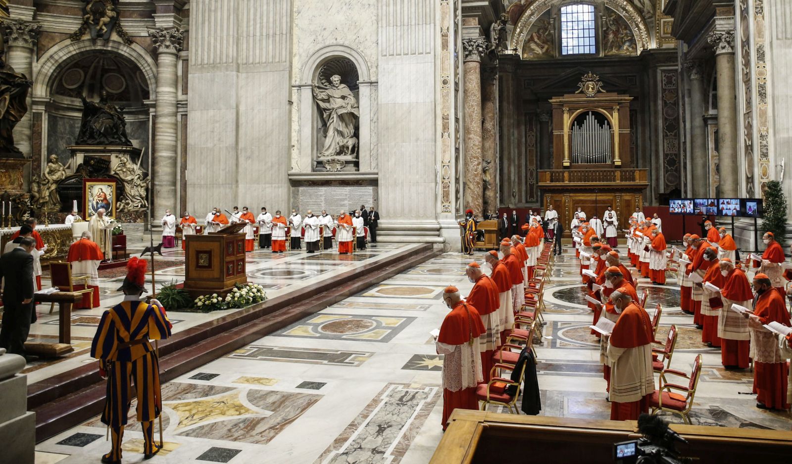 epa08848981 Pope Francis (L) during a consistory ceremony in the Saint Peter's basilica at the Vatican City, 28 November 2020. Pope Francis will create 13 new Cardinals, including first ones from Bruinei and Rwanda and first African American.  EPA/FABIO FRUSTACI