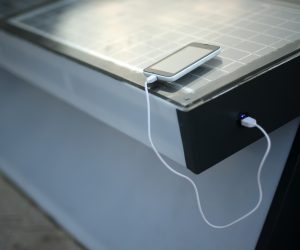 15.08.2015., Solin - Ivan Mrvos (20), student prve godine splitskog FESB-a izumitelj je solarne e-klupe koja je postavljena ispred Gradske uprave u Solinu te je prva takva u Hrvatskoj. Klupa ima cetiri USB izlaza/ulaza, ima hotspot za internet, senzore za kvalitetu zraka, a nocu svijetli i tako moze sluziti kao javna rasvjeta. Grad Solin financirao je materijal za izradu klupe a Ivan Mrvos je posao odradio besplatno. 
Photo: Sanjin Strukic/PIXSELL