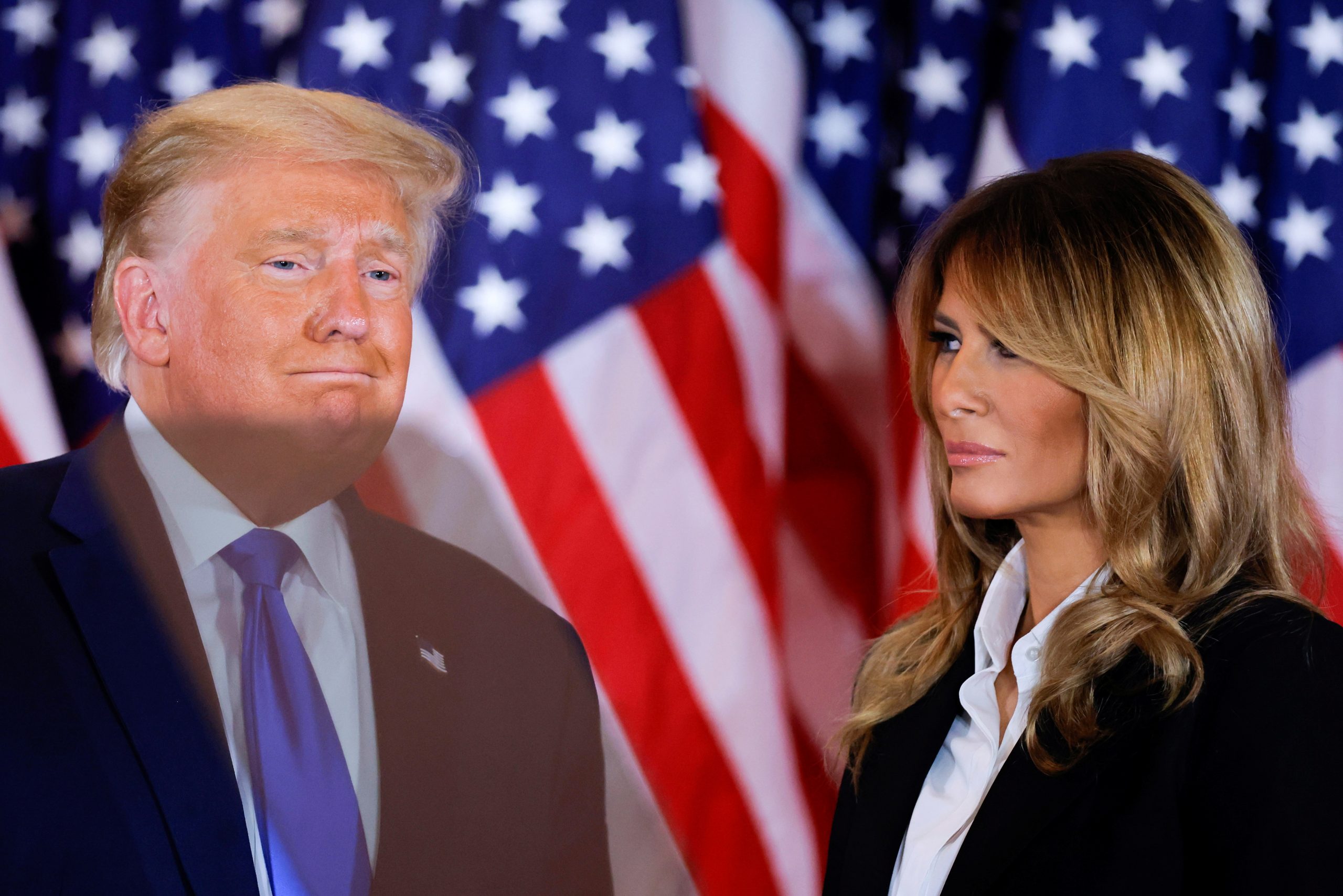 2020 U.S. presidential election in Washington D.C. U.S. President Donald Trump accompanied by first lady Melania Trump reacts to early results from the 2020 U.S. presidential election in the East Room of the White House in Washington, U.S., November 4, 2020. REUTERS/Carlos Barria CARLOS BARRIA