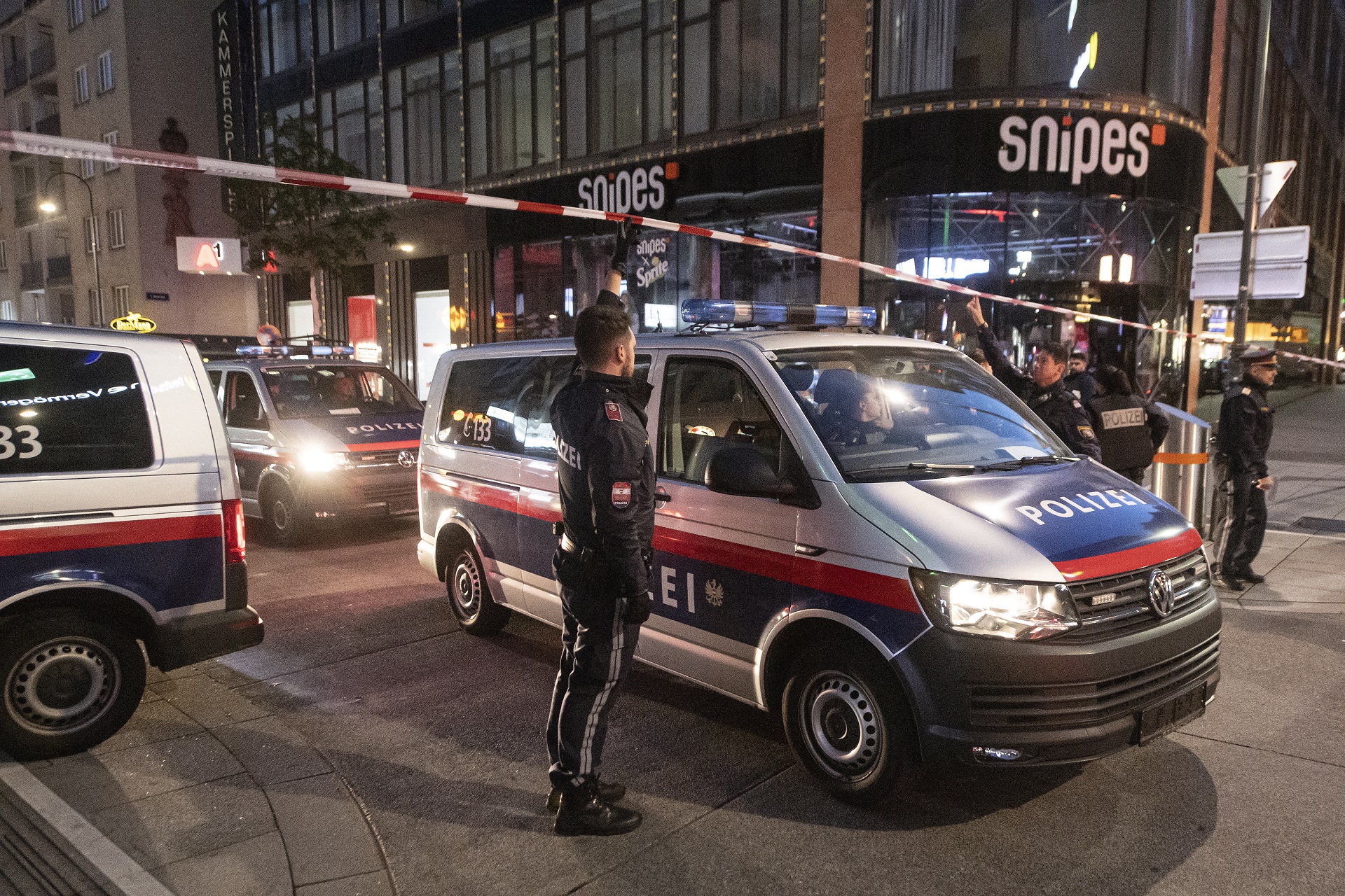 epa08794543 Austrian police gather after multiple shootings in the first district of Vienna, Austria, 03 November 2020. According to recent reports, at least three persons are reported to have died and many are seriously injured in what officials treat as a terror attack which took place in the evening of 02 November.  EPA/CHRISTIAN BRUNA