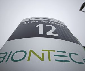 epa08810796 The logo of German biopharmaceutical company BionTech in Mainz, Germany, 10 November 2020. According to a statement by Mainz-based pharmaceutical company Biontech, its vaccination allegedly offers more than 90 percent protection against the disease Covid-19.  EPA/RONALD WITTEK