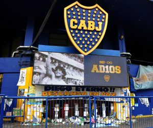 epa08852139 A view of an altar in honor of Diego Armando Maradona, during a match between Boca and Newell's Old Boys, in La Bombonera, La Boca neighborhood, Buenos Aires, Argentina, 29 November 2020.  EPA/Enrique Garcia Medina