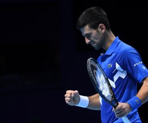 epa08831432 Novak Djokovic of Serbia in action against Alexander Zverev of Germany during their group stage match at the ATP Finals tennis tournament in London, Britain, 20 November 2020.  EPA/ANDY RAIN