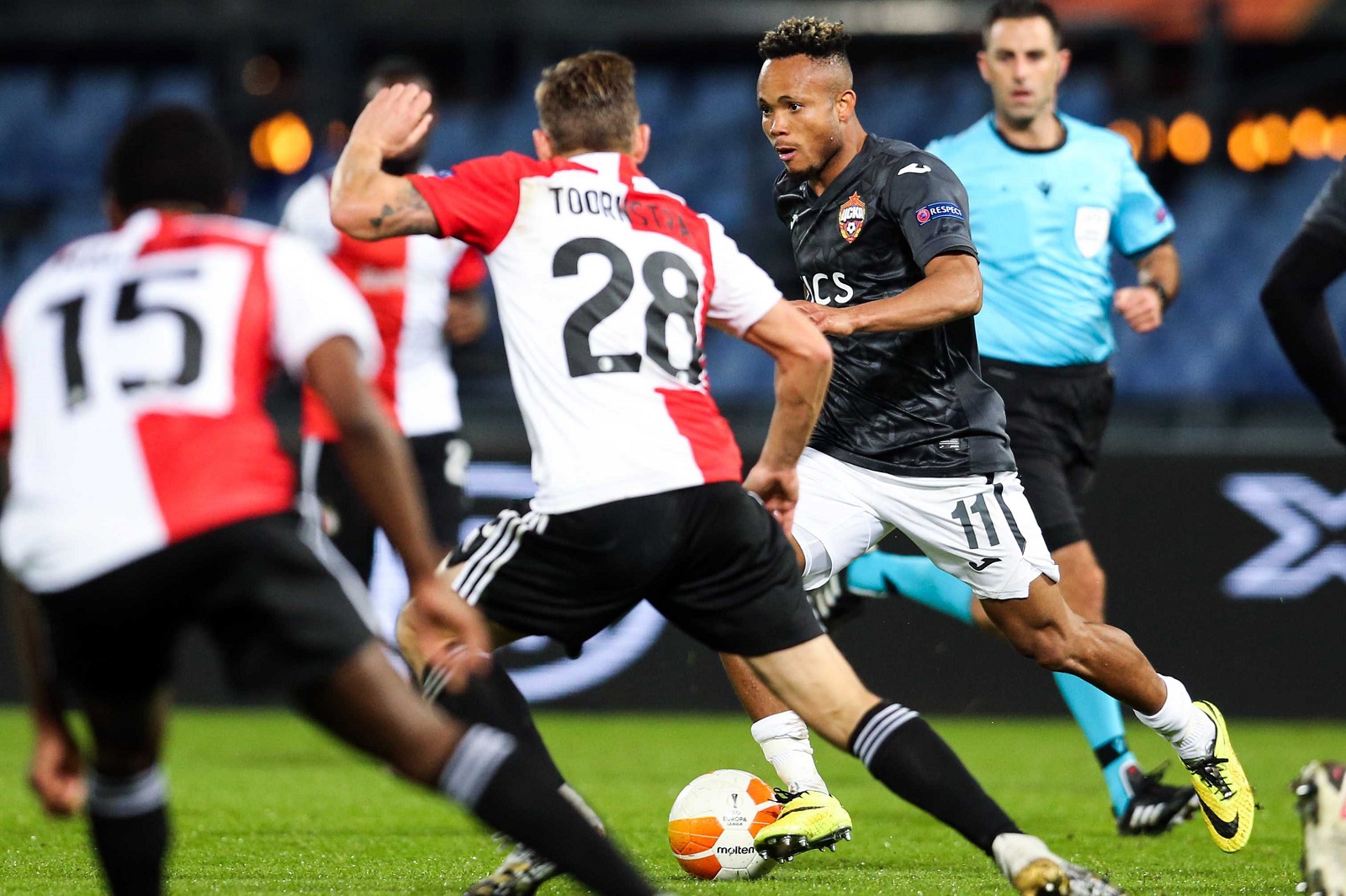 epa08802102 Chidera Ejuke (R) of CSKA Moscow in action during a UEFA Europa League group K match between Feyenoord and CSKA Moscow in the Kuip in Rotterdam, The Netherlands, 05 November 2020 (issued 06 November 2020).  EPA/Pieter Stam de Jonge