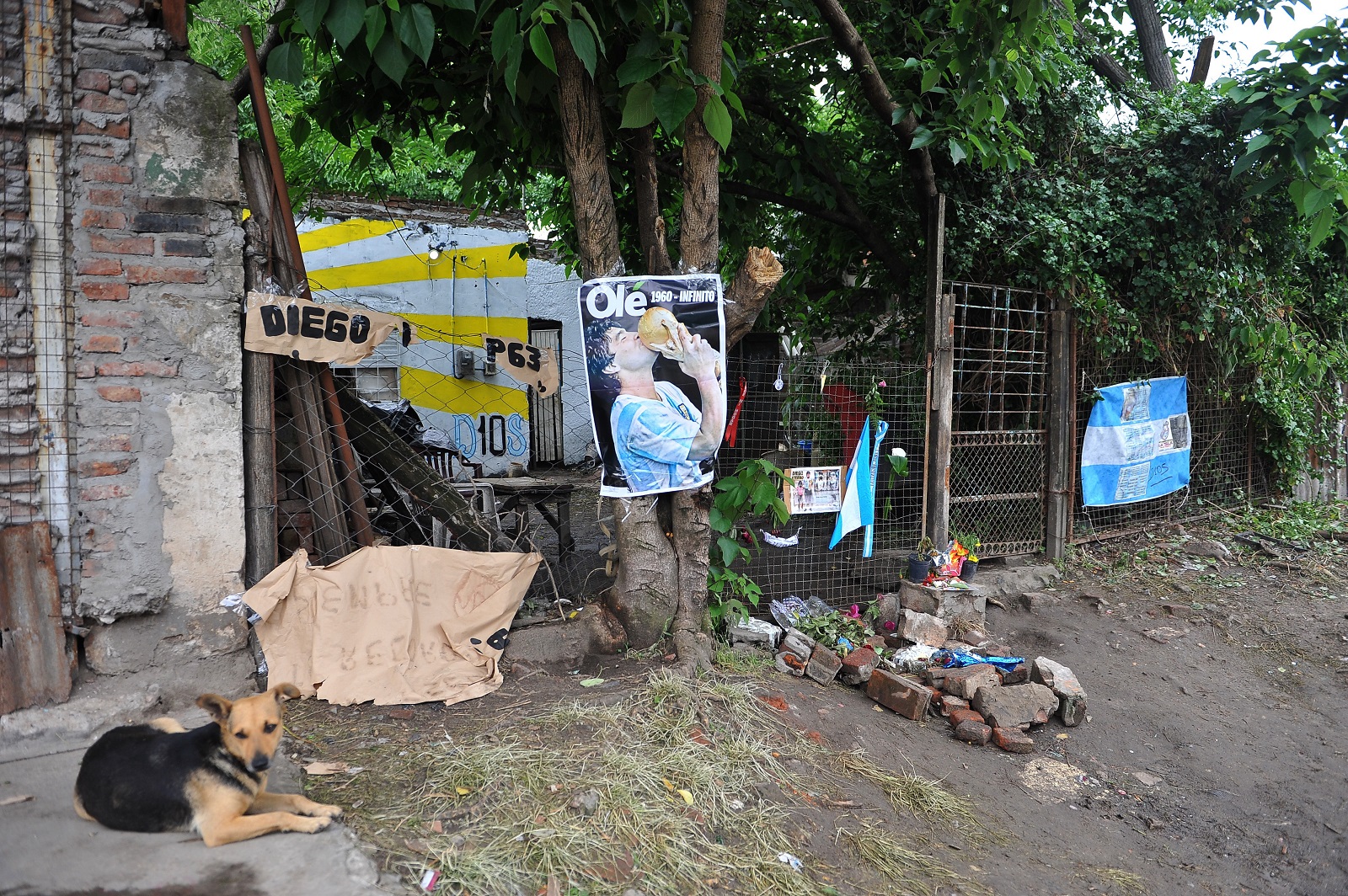 epa08850062 A view of the the house where Diego Armando Maradona lived, in Azamor street, Villa Fiorito, Buenos Aires province, Argentina, 28 November 2020. Argentinian soccer legend Diego Maradona died on 25 November at the age of 60.  EPA/Enrique Garcia Medina