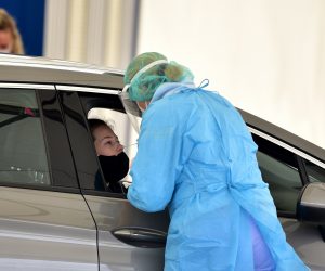 epa08761931 A Coronavirus SARS-CoV-2 Drive In testing station in Ljubljana, Slovenia, 21 October 2020. Slovenia declared tighter coronavirus countermeasures on 19 October 2020 with the closing of cafes and bars, fitness centers and a police curfew from 09 p.m. to 06 a.m., plus cancelled all entertainment events in order to prevent the spread of the SARS-CoV-2 coronavirus, which causes the SARS-CoV-2 disease.  EPA/IGOR KUPLJENIK