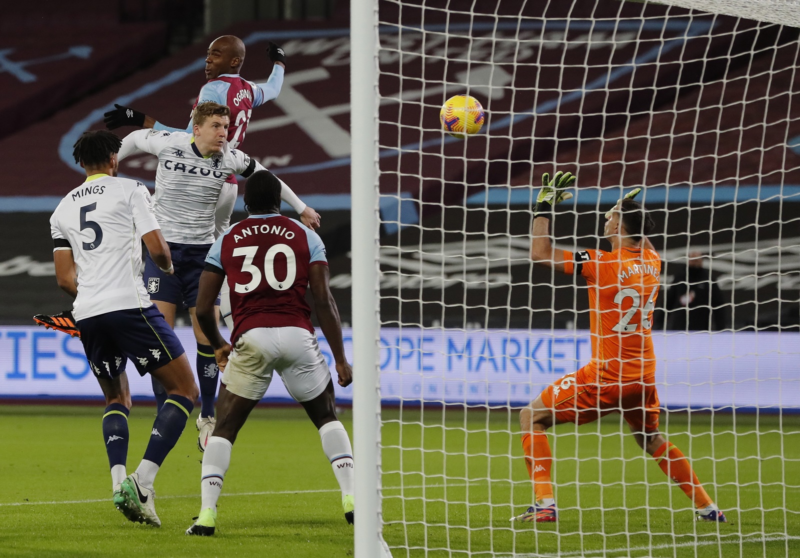 epa08853702 Angelo Ogbonna of West Ham (C) scores his team's opening goal during the English Premier League soccer match between West Ham United and Aston Villa in London, Britain, 30 November 2020.  EPA/Frank Augstein / POOL EDITORIAL USE ONLY. No use with unauthorized audio, video, data, fixture lists, club/league logos or 'live' services. Online in-match use limited to 120 images, no video emulation. No use in betting, games or single club/league/player publications.