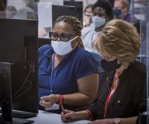 epaselect epa08802081 Adjudicators continue to check ballots at the Maricopa County Recorder's Office  Phoenix, Arizona, USA, 05 November 2020. The 2020 US Presidential Election result remains undetermined as votes continued to be counted in several key battleground states.  EPA/RICK D'ELIA