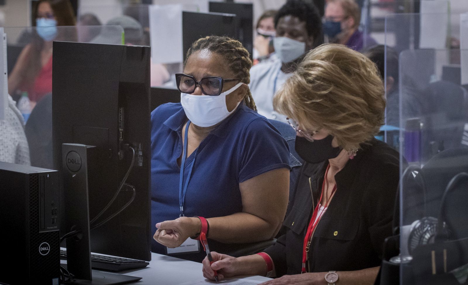 epaselect epa08802081 Adjudicators continue to check ballots at the Maricopa County Recorder's Office  Phoenix, Arizona, USA, 05 November 2020. The 2020 US Presidential Election result remains undetermined as votes continued to be counted in several key battleground states.  EPA/RICK D'ELIA