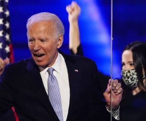 epa08806605 US President-elect Joe Biden reacts after delivering his victory address after being declared the winner in the 2020 presidential election in Wilmington, Delaware, USA, 07 November 2020. Biden defeated incumbent US President Donald J. Trump.  EPA/JIM LO SCALZO
