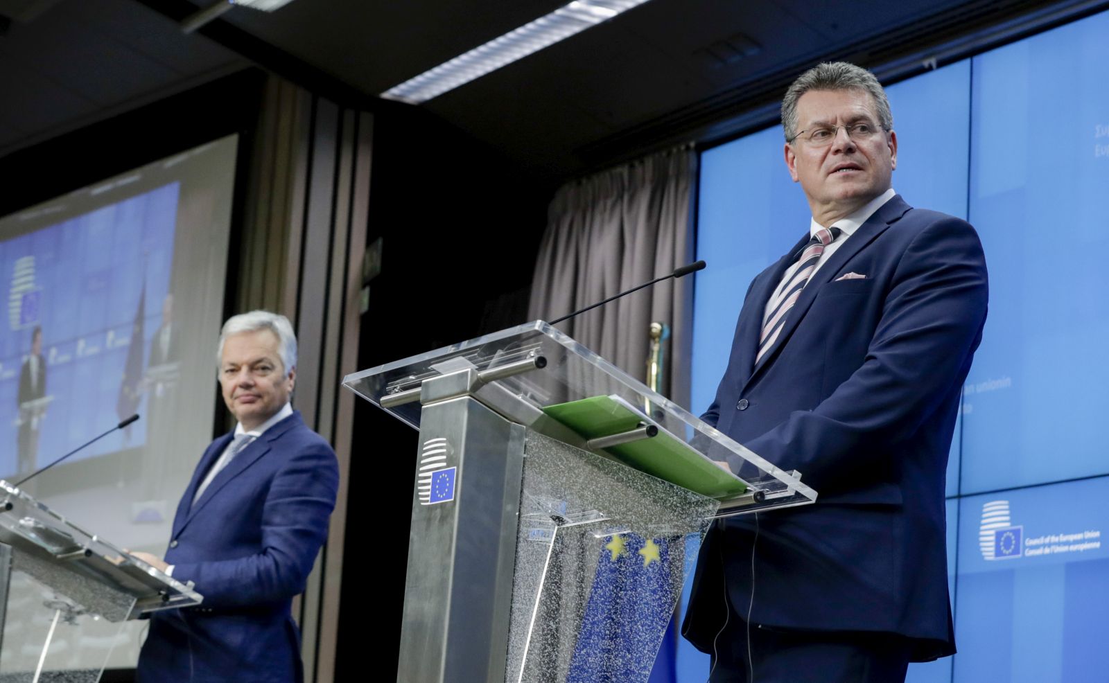 epa08825767 European Commissioner for Justice Didier Reynders (L) and EU Commission Vice President Maros Sefcovic (R) during a news conference at the end of a Informal Video conference of European Affairs Ministers in Brussels, Belgium, 17 November 2020.  European ministers' discussion mainly focused on Rule of Law and Multi annual framework (MFF), after Poland and Hungary announce a day earlier they will veto the European budget.  EPA/OLIVIER HOSLET