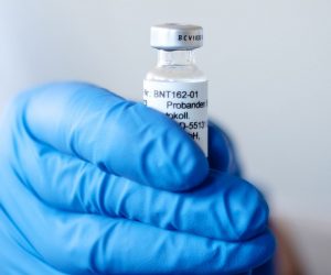 epa08830895 An undated handout made available by the German pharmaceutical company Biontech shows a hand holding an ampoule with BNT162b2, the mRNA-based vaccine candidate against COVID-19, in Mainz, Germany (reissued 20 November 2020).  Biontech and US pharmaceutical company Pfitzer have requested emergency authorisation for coronavirus vaccine in US, it was reported 20 November 2020.  EPA/BIONTECH SE / HANDOUT  HANDOUT EDITORIAL USE ONLY/NO SALES
