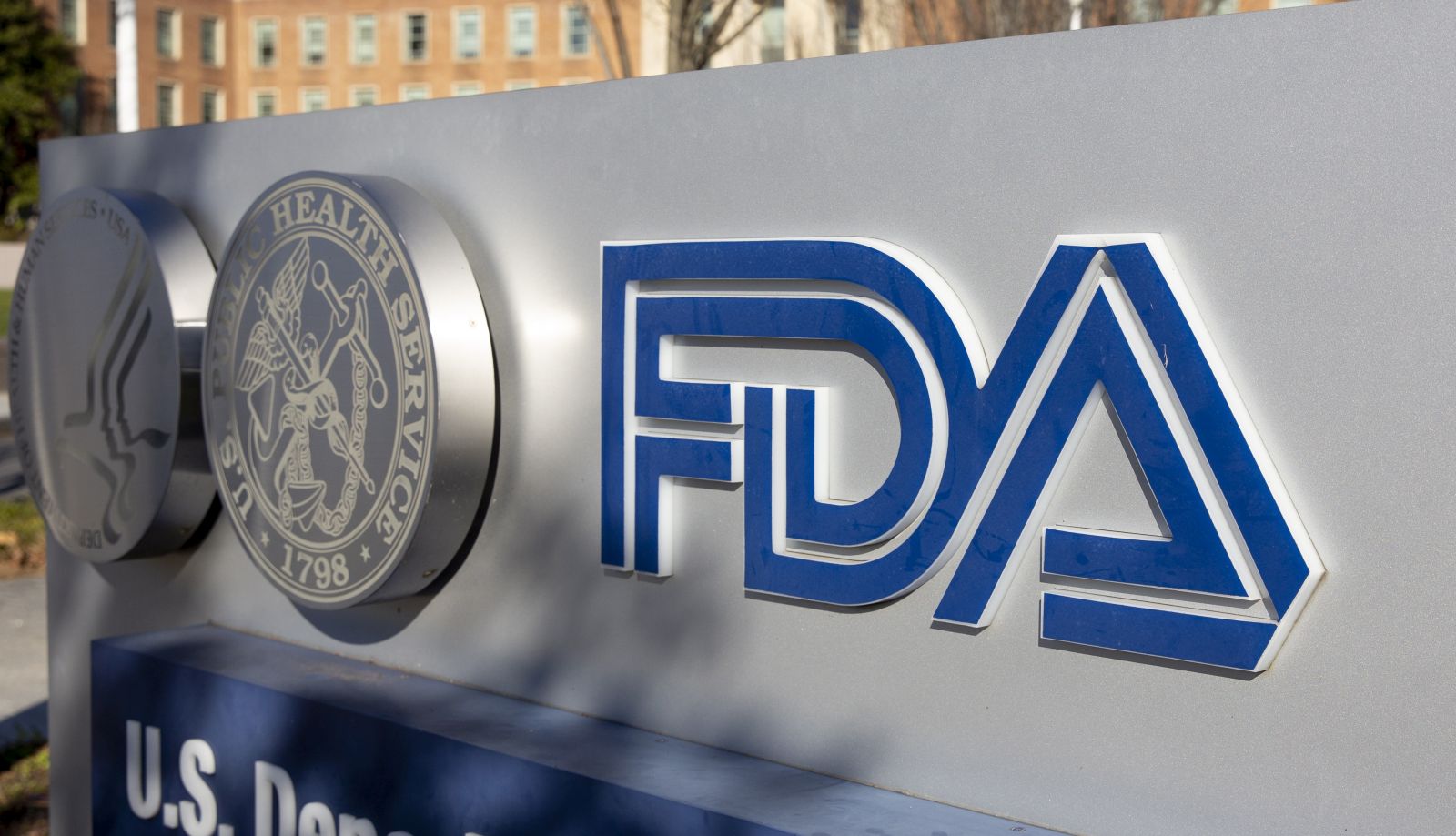 epa08831966 A United States Food and Drug Administration (FDA) sign is seen at the White Oak campus in Silver Spring, Maryland, USA, 20 November 2020. Pfizer Inc. and BioNTech SE are seeking authorization from regulators at the FDA to use their COVID-19 vaccine.  EPA/MICHAEL REYNOLDS