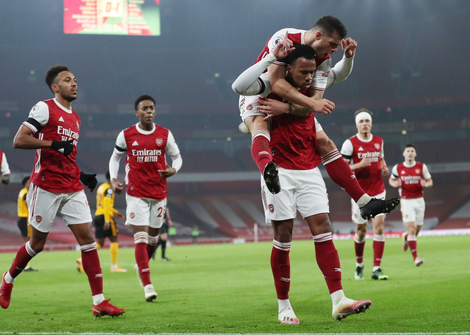 epa08851915 Gabriel of Arsenal (R) celebrates with team-mates after scoring his team's opening goal during the English Premier League soccer match between Arsenal FC and Wolverhampton Wanderers in London, Britain, 29 November 2020.  EPA/Catherine Ivill / POOL EDITORIAL USE ONLY. No use with unauthorized audio, video, data, fixture lists, club/league logos or 'live' services. Online in-match use limited to 120 images, no video emulation. No use in betting, games or single club/league/player publications.