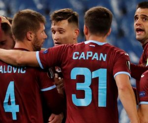 epa08860642 HNK Rijeka's Darko Velkovski (2-L) celebrates with teammates after scoring the 0-1 lead during the UEFA Europa League Group F  match between Real Sociedad and HNK Rijeka at Reale Arena stadium in San Sebastian, Basque Country, Spain, 03 December 2020.  EPA/Juan Herrero