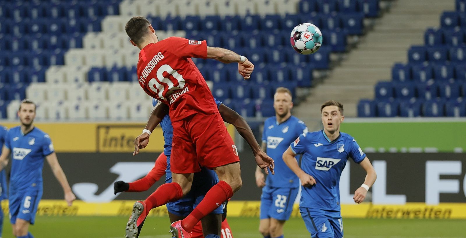 epa08869093 Augsburg's Daniel Caligiuri (C) scores his team's first goal during the German Bundesliga soccer match between TSG 1899 Hoffenheim and FC Augsburg in Sinsheim, Germany, 07 December 2020.  EPA/RONALD WITTEK / POOL CONDITIONS - ATTENTION: The DFL regulations prohibit any use of photographs as image sequences and/or quasi-video.