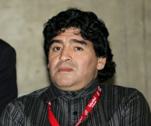 epa08873619 (FILE) - Former Argentinian soccer star Diego Maradona (R) and former Italian striker Paolo Rossi (L) watch a training session of AC Milan at Ataturk Olympic Stadium in Istanbul, Tuesday 24 May 2005 (reissued 10 December 2020). According to news reports, Paolo Rossi died aged 64 on 09 December 2020. As part of FIFA's 100th anniversary, in 2004 Rossi was named as one of the Top 125 greatest living footballers.  EPA/DANIEL DAL ZENNARO