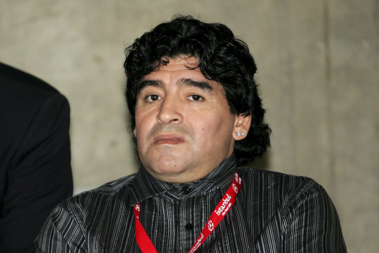 epa08873619 (FILE) - Former Argentinian soccer star Diego Maradona (R) and former Italian striker Paolo Rossi (L) watch a training session of AC Milan at Ataturk Olympic Stadium in Istanbul, Tuesday 24 May 2005 (reissued 10 December 2020). According to news reports, Paolo Rossi died aged 64 on 09 December 2020. As part of FIFA's 100th anniversary, in 2004 Rossi was named as one of the Top 125 greatest living footballers.  EPA/DANIEL DAL ZENNARO
