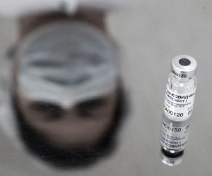 epa08876755 (FILE)  Russia's Sputnik V vaccine against COVID-19 disease on the table at a policlinic in Moscow, Russia, 05 December 2020 (reissued 11 December 2020). According to reports on 11 December 2020, British biopharmaceutical company AstraZeneca announced that it will test its coronavirus vaccine combined with Russian Sputnik V vaccine to increase the Covid-19 vaccines efficiency.  EPA/MAXIM SHIPENKOV