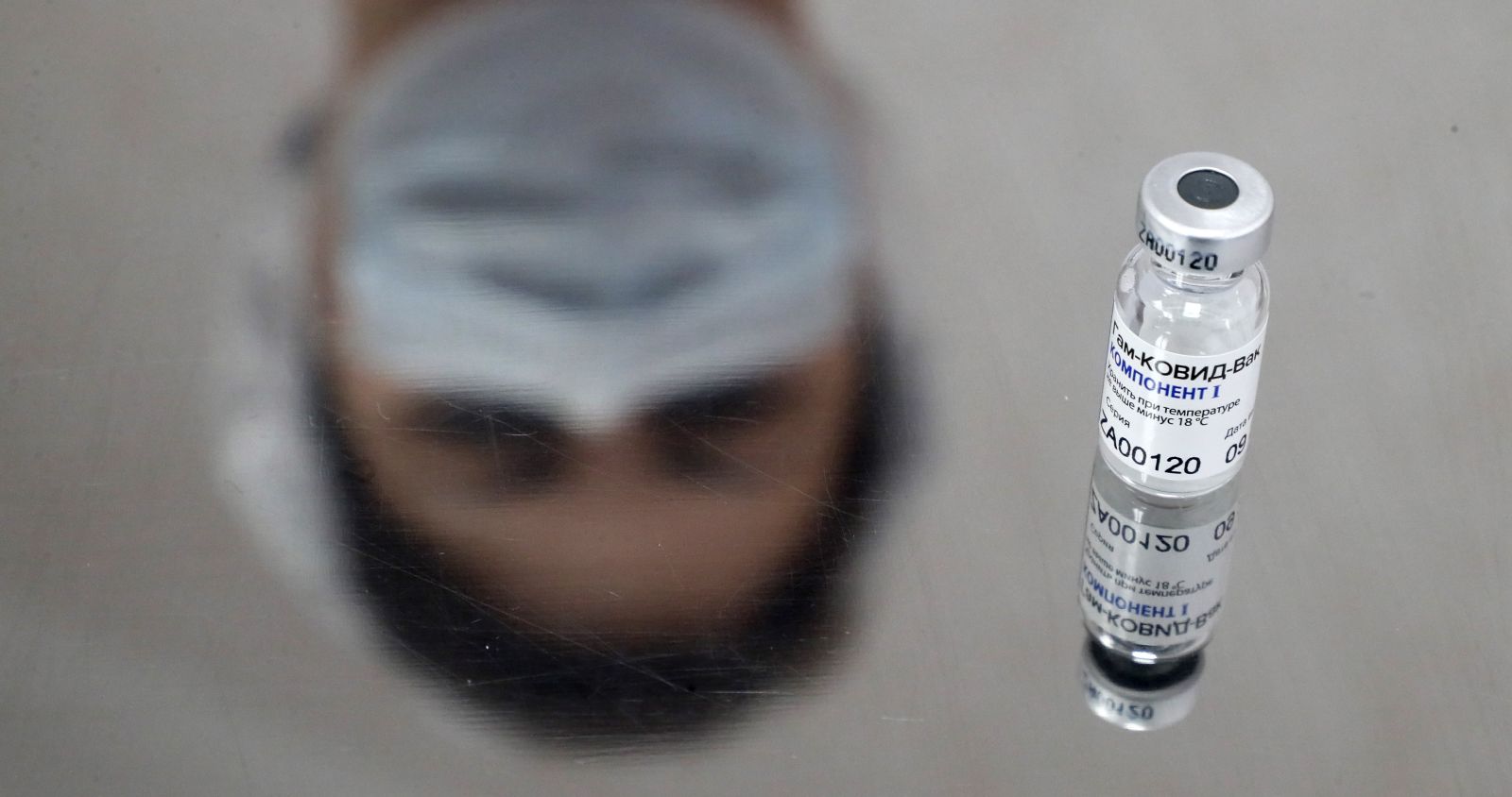 epa08876755 (FILE)  Russia's Sputnik V vaccine against COVID-19 disease on the table at a policlinic in Moscow, Russia, 05 December 2020 (reissued 11 December 2020). According to reports on 11 December 2020, British biopharmaceutical company AstraZeneca announced that it will test its coronavirus vaccine combined with Russian Sputnik V vaccine to increase the Covid-19 vaccines efficiency.  EPA/MAXIM SHIPENKOV