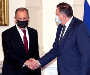 epa08884881 Russian Minister of Foreign Affairs Sergei Lavrov (L) shakes hands with Chairman of Bosnian Presidency Milorad Dodik (R) in Sarajevo, Bosnia and Herzegovina, 15 December 2020. Lavrov arrived for a two-day working visit to Bosnia and Herzegovina.  EPA/FEHIM DEMIR