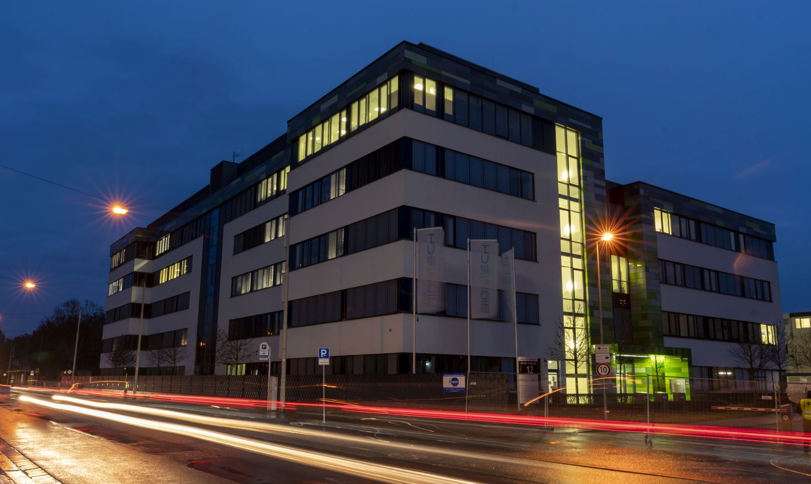 epa08898184 An exterior view during the blue hour of a building of biopharmaceutical company BionTech in Mainz, Germany, 21 December 2020. The European Medicines Agency has approved the conditional use of the Pfizer / BioNTech coronavirus vaccine.  EPA/RONALD WITTEK