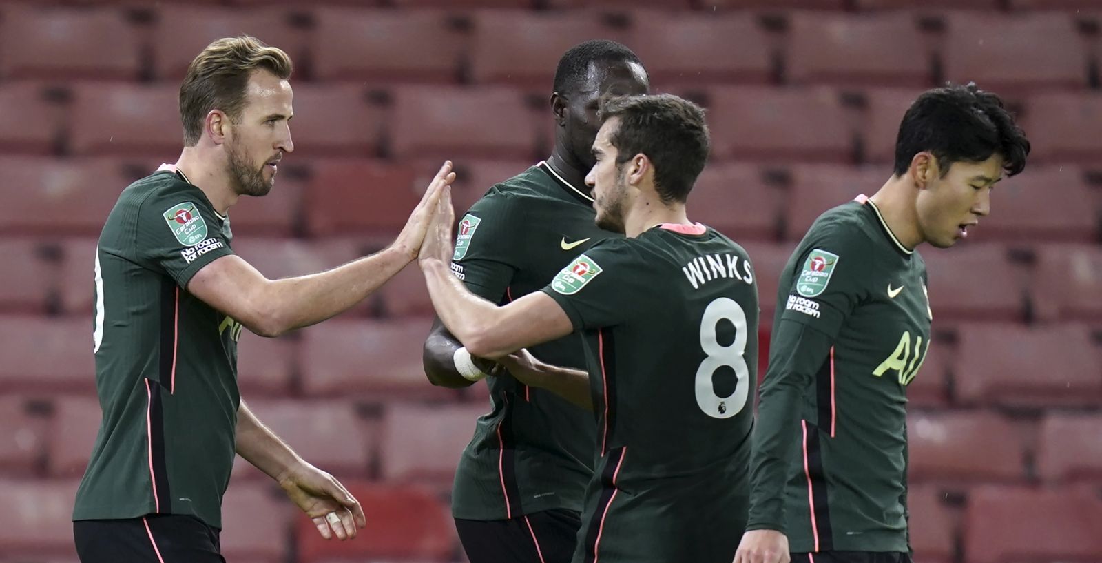 epa08901399 Harry Kane (L) of Tottenham celebrates with team-mates after scoring the 3-1 lead during the Carabao Cup quarter final mach between Stoke City and Tottenham Hotspur in Stoke, Britain, 23 December 2020.  EPA/TIM KEETON EDITORIAL USE ONLY. No use with unauthorized audio, video, data, fixture lists, club/league logos or 'live' services. Online in-match use limited to 120 images, no video emulation. No use in betting, games or single club/league/player publications.