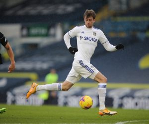 epa08906150 Patrick Bamford (R) of Leeds in action during the English Premier League soccer match between Leeds United and Burnley FC in Leeds, Britain, 27 December 2020.  EPA/Molly Darlington / POOL EDITORIAL USE ONLY. No use with unauthorized audio, video, data, fixture lists, club/league logos or 'live' services. Online in-match use limited to 120 images, no video emulation. No use in betting, games or single club/league/player publications.