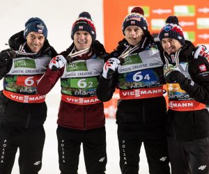 epa08882219 Piotr Zyla of Poland, Andrzej Stekala of Poland, Dawid Kubacki of Poland and Kamil Stoch of Poland pose with their bronze medals during the award ceremony of the Men's HS240 Team competition at the Ski Flying World Championships in Planica, Slovenia, 13 December 2020.  EPA/VID PONIKVAR