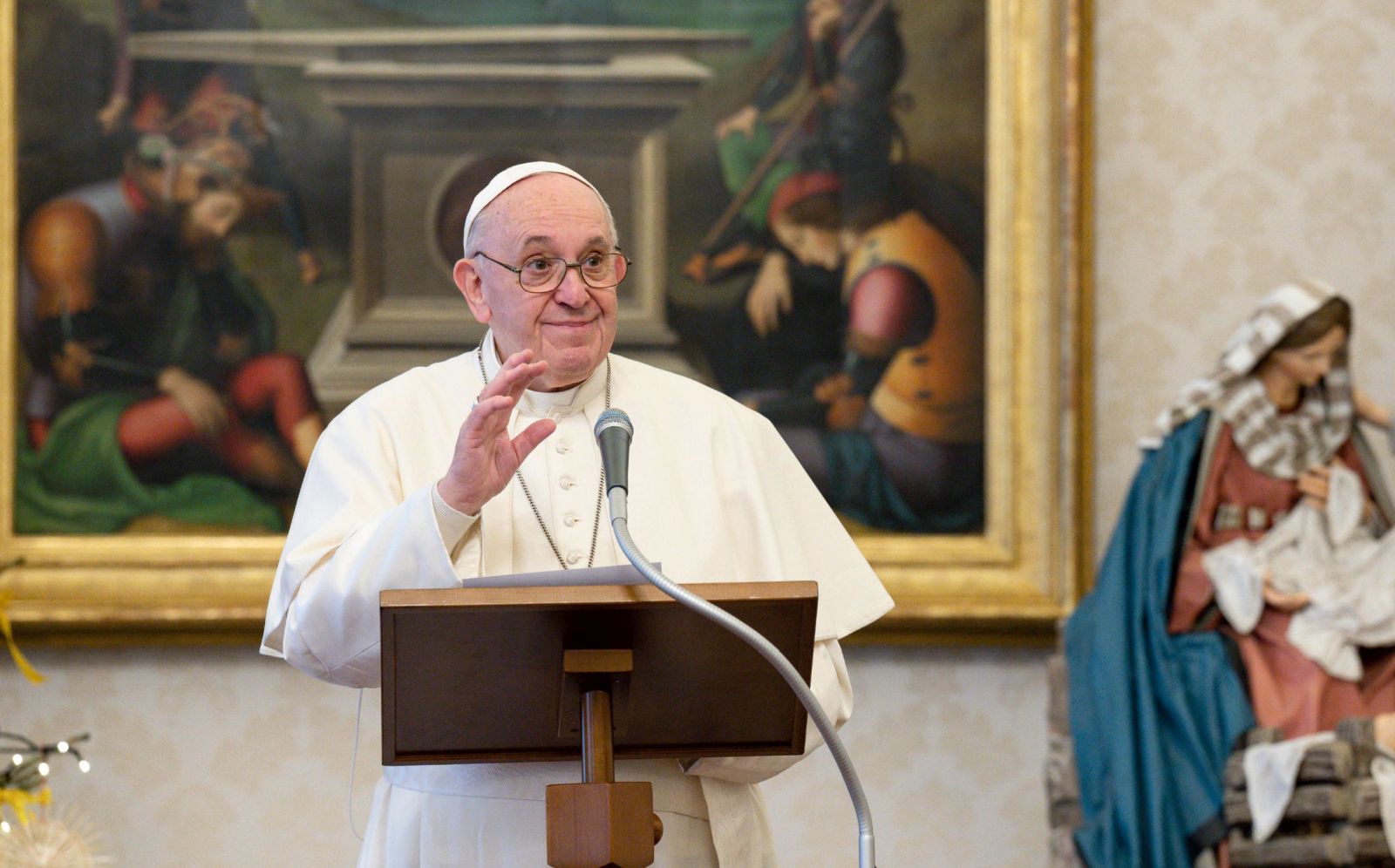 epa08907590 A handout picture provided by the Vatican Media shows Pope Francis reacting during his Angelus Prayer from the library of the Palazzo Apostolico, in Vatican City, 27 December 2020 (issued 28 December 2020).  EPA/VATICAN MEDIA HANDOUT  HANDOUT EDITORIAL USE ONLY/NO SALES
