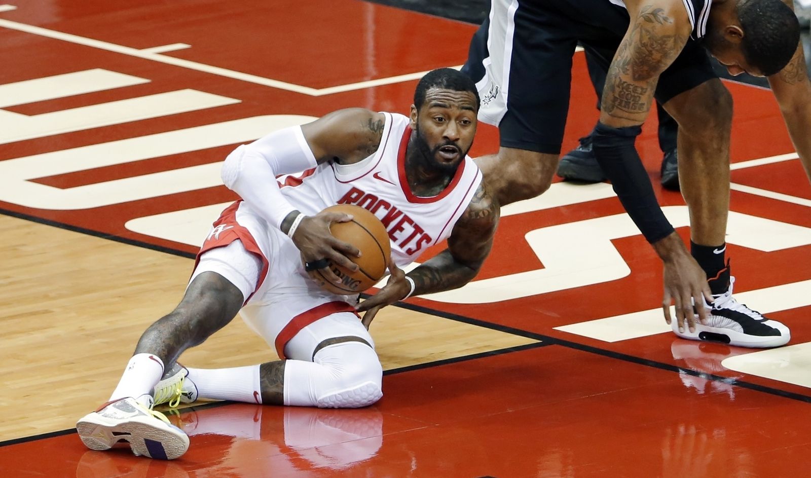 NBA: Preseason-San Antonio Spurs at Houston Rockets Dec 15, 2020; Houston, TX, USA; Houston Rockets guard John Wall (1) comes up with a loose ball in front of San Antonio Spurs forward LaMarcus Aldridge (12) during the first half. Mandatory Credit: Mike Wyke/Pool Photo via USA TODAY Sports Mike Wyke