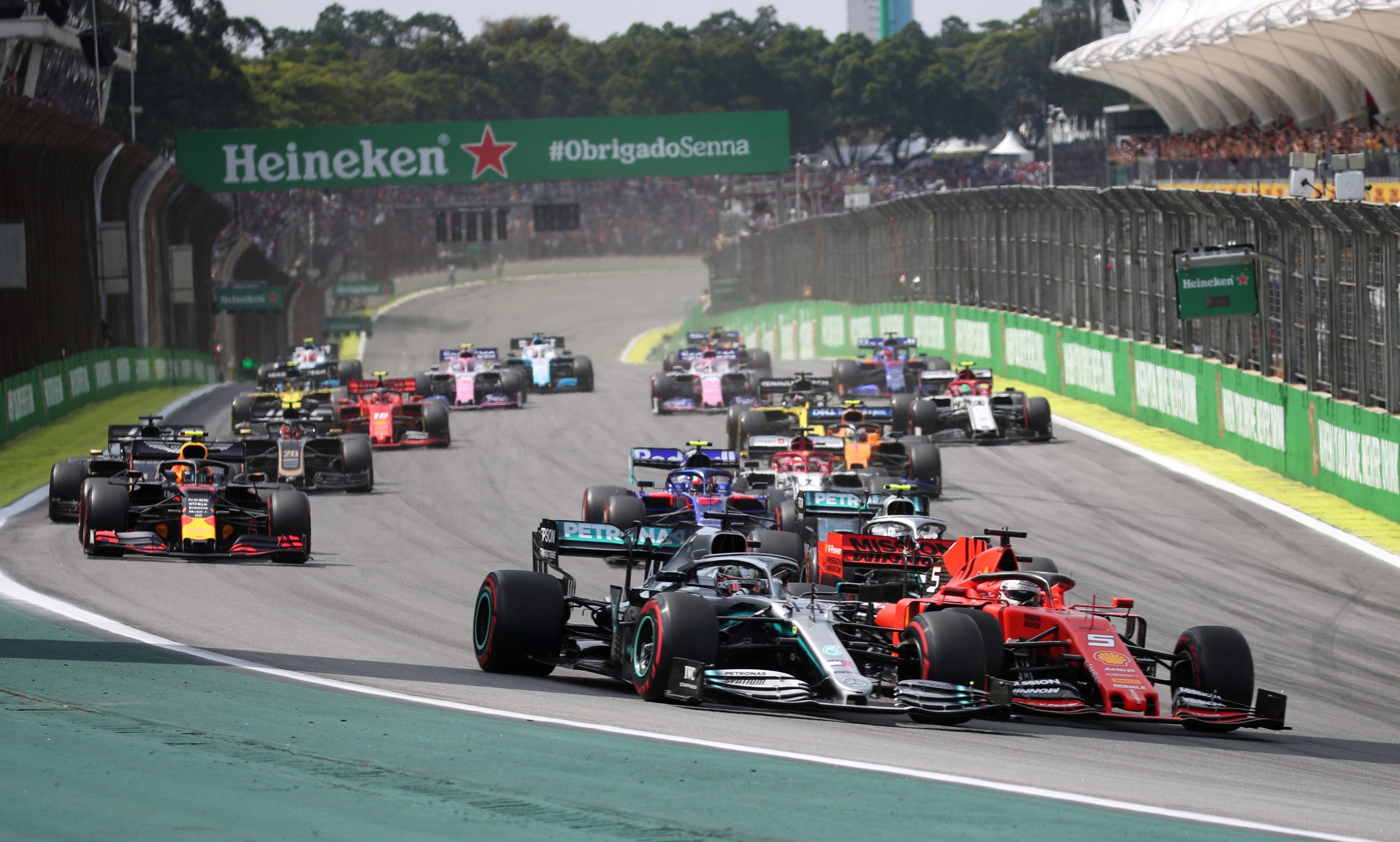 FILE PHOTO: Formula One F1 - Brazilian Grand Prix FILE PHOTO: Formula One F1 - Brazilian Grand Prix - Autodromo Jose Carlos Pace, Interlagos, Sao Paulo, Brazil - November 17, 2019  Ferrari's Sebastian Vettel and Mercedes' Lewis Hamilton in action at the start of the race  REUTERS/Ricardo Moraes/File Photo RICARDO MORAES