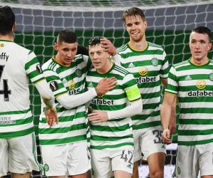 epa08876046 Celtic captain Callum McGregor (C) is celebrated by teammates after scoring with a penalty during the UEFA Europa League group H soccer match between Celtic Glasgow vs OSC Lille in Glasgow, Britain, 10 December 2020.  EPA/Andy Buchanan / POOL