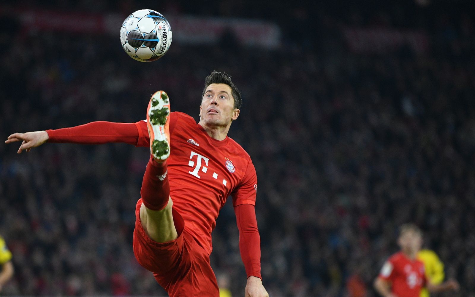 epa08890528 (FILE) - Bayern Munich's Robert Lewandowski in action during the German Bundesliga soccer match between Bayern Munich and Borussia Dortmund in Munich, Germany, 09 November 2019 (re-issued on 17 December 2020). Polish striker Robert Lewandowski has been named The Best FIFA Men's Player during the virtual Best FIFA Football Awards 2020 on 17 December 2020.  EPA/PHILIPP GUELLAND CONDITIONS - ATTENTION: The DFL regulations prohibit any use of photographs as image sequences and/or quasi-video.