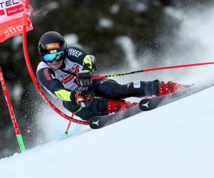 epa08895301 Filip Zubcic of Croatia clears a gate during the first run of the Men's Giant Slalom race at the Alpine Skiing World Cup in Alta Badia, Italy, 20 December 2020.  EPA/ANDREA SOLERO