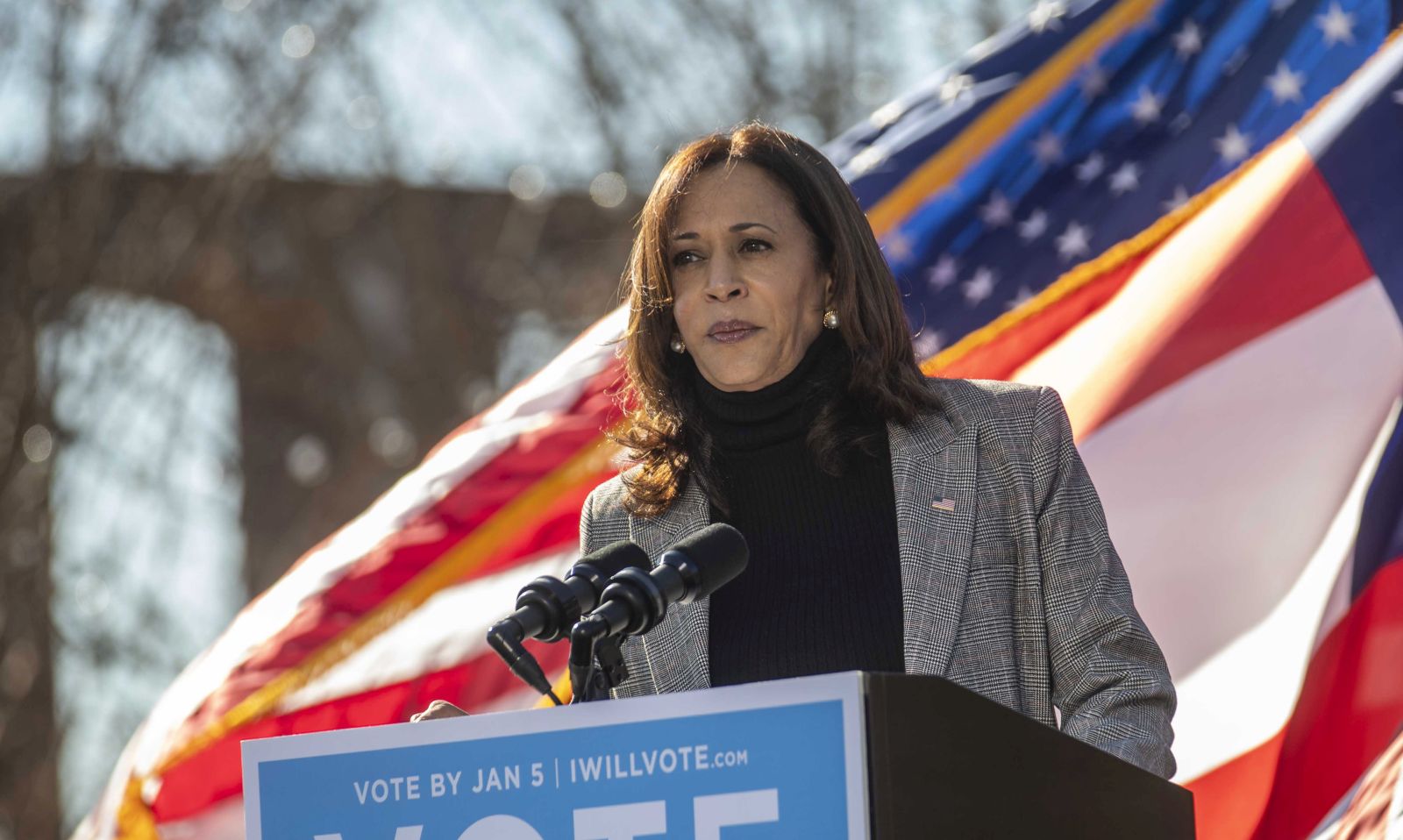 epa08898750 US Vice President-elect Kamala Harris speaks during a car rally in Columbus, Georgia, USA, 21 December 2020. Vice President-elect Harris was in Georgia stumping for US Senate Democratic candidates Jon Ossoff and Rev. Rahpael Warnock.  EPA/Alyssa Pointer / POOL