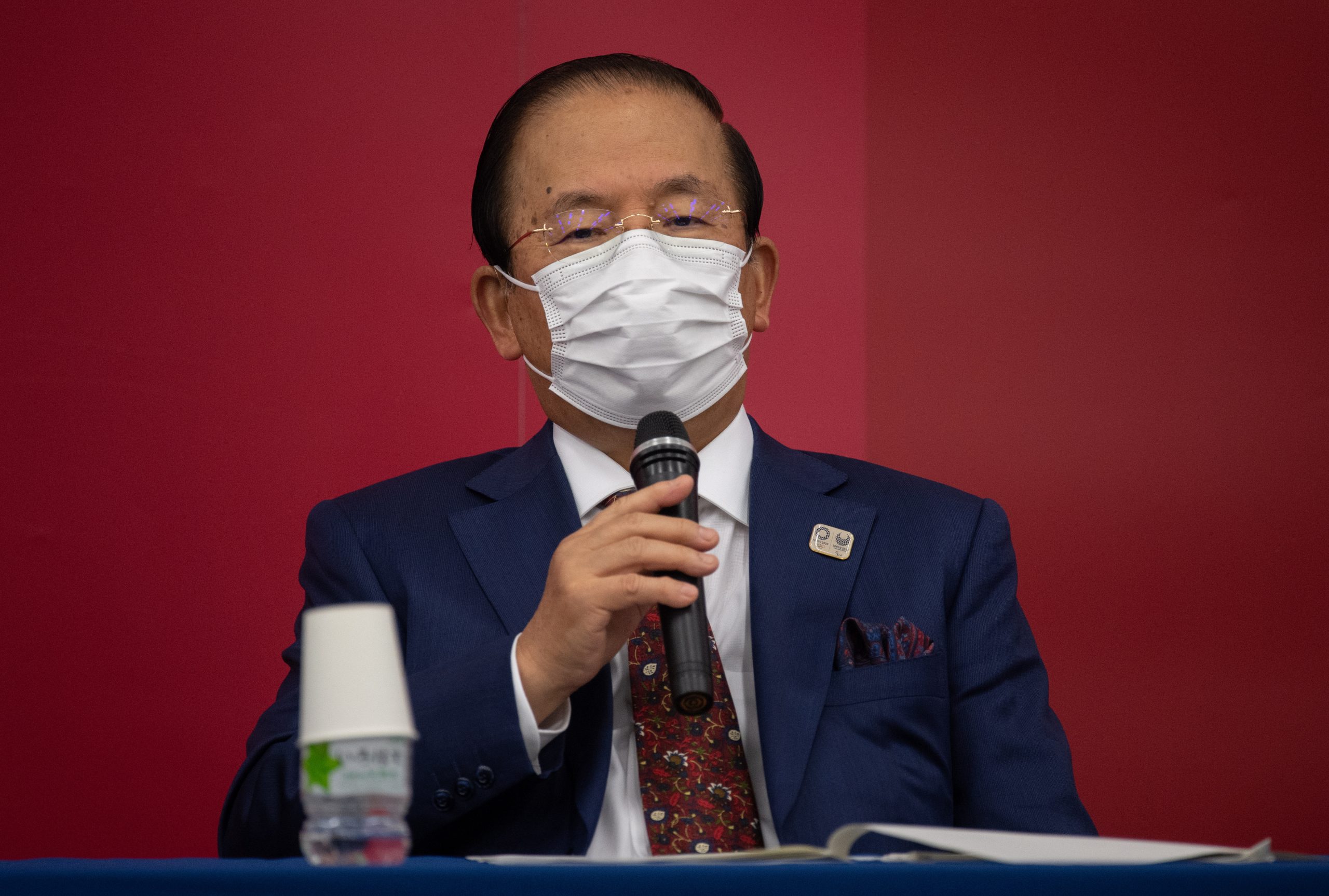 epa08899001 Tokyo 2020 Olympic Games CEO Toshiro Muto wears a face mask as he speaks during a press conference following a Tokyo2020 Olympics Executive Board meeting in Tokyo, Japan, 22 December 2020.  EPA/Carl Court / POOL