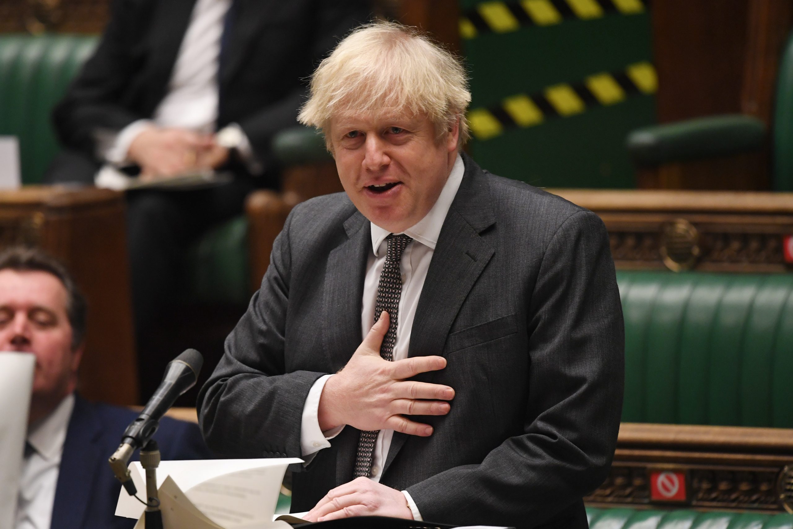 epa08911456 A handout photograph released by the UK Parliament shows Britain's Prime Minister Boris Johnson during during the debate in the House of Commons on the EU (Future Relationship) Bill  in London, Britain, 30 December 2020.  EPA/JESSICA TAYLOR/UK PARLIAMENT HANDOUT  HANDOUT EDITORIAL USE ONLY/NO SALES