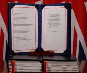 epa08912242 A handout photo made available by n10 Downing Street shows the Trade and Cooperation Agreement between the UK and the EU, the Brexit trade deal, signed by Britain's Prime Minister Boris Johnson, at 10 Downing Street London, Britain, 30 December 2020 (issued 31 December 2020).  EPA/ANDREW PARSONS/DOWNING STREET HANDOUT -- The Image can not be altered in any form. -- HANDOUT EDITORIAL USE ONLY/NO SALES
