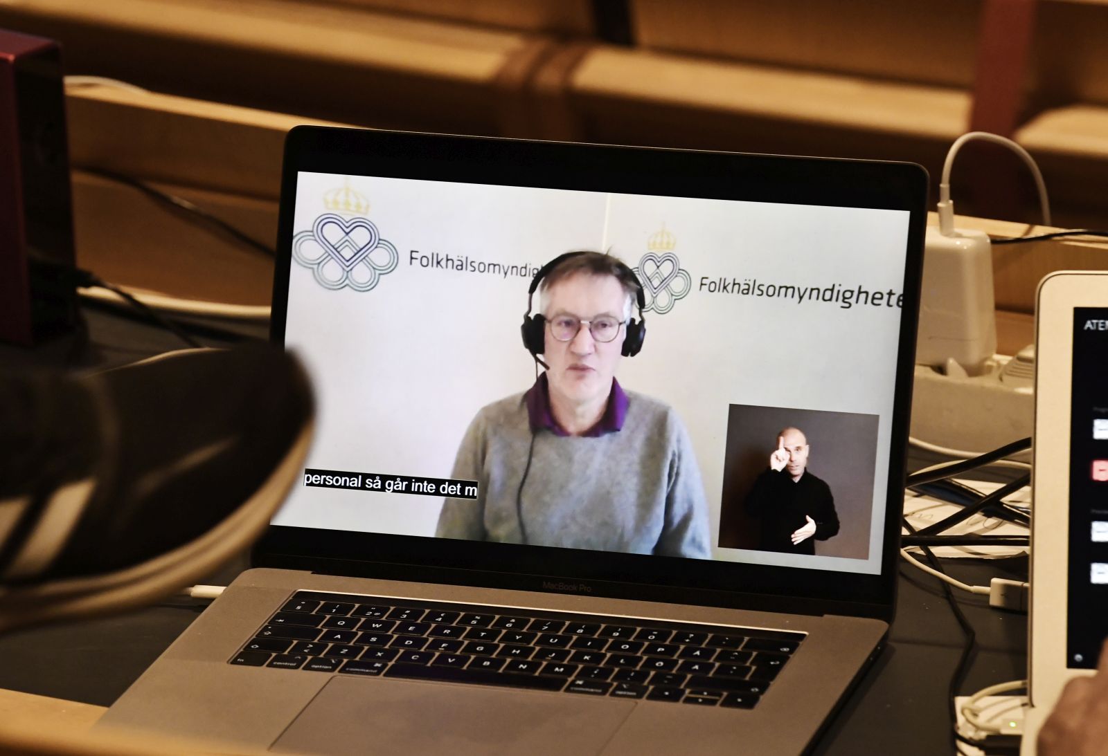 epa08920230 State epidemiologist Anders Tegnell of the Public Health Agency of Sweden is seen displayed on a laptop screen during a digital news conference updating on the coronavirus disease (COVID-19) pandemic situation, in Stockholm, Sweden, 05 January 2021.  EPA/JANERIK HENRIKSSON SWEDEN OUT